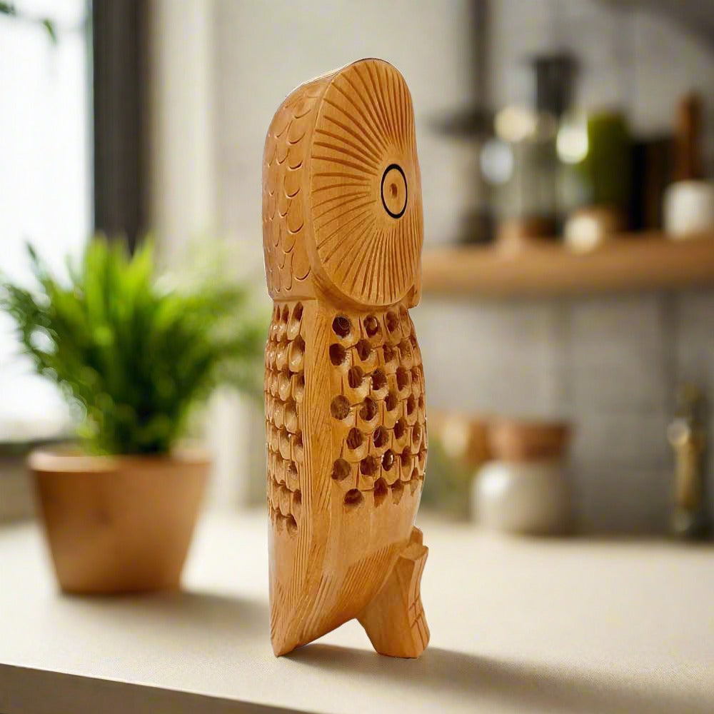 A wooden owl sculpture with very fine hand workmanship.