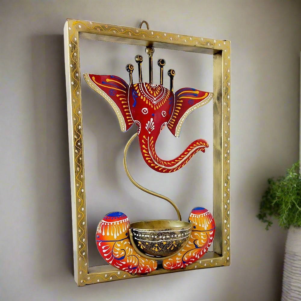 A beautiful Ganesha wall decor candle stand, a perfect gift for weddings, anniversaries, or birthdays.