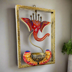 A beautiful Ganesha wall decor candle stand, a perfect gift for weddings, anniversaries, or birthdays.