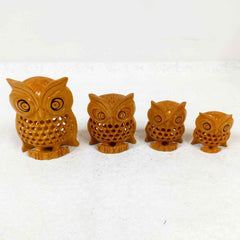 Beautifully crafted wooden owl set designed for gifting or decorating home spaces, featuring hand-carved mesh details.