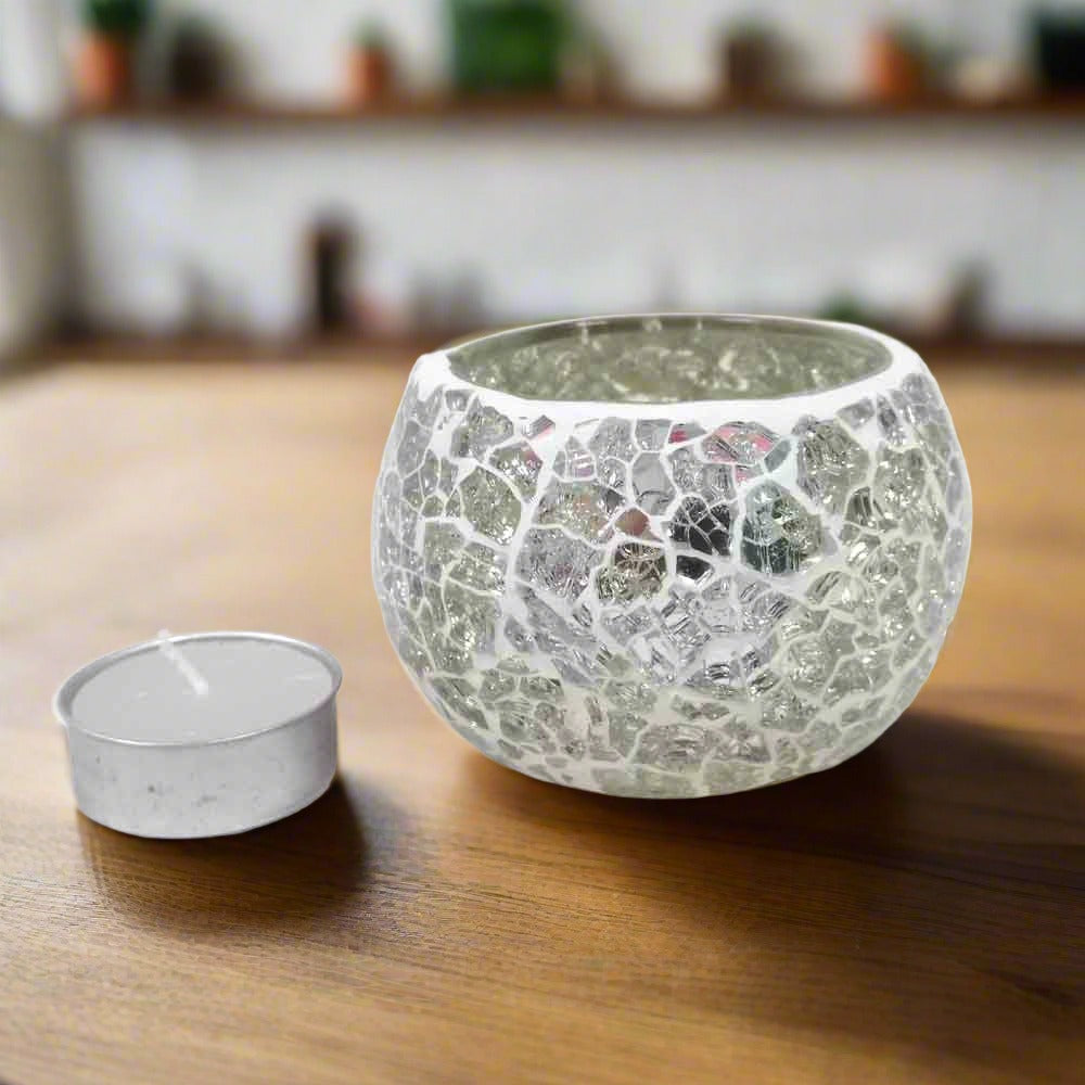 Glowing glass crackle candle holder that enhances pooja room or home decor with included candle.