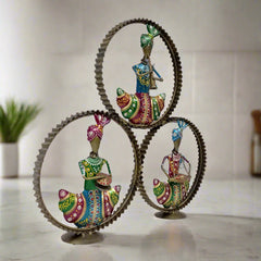 Golden ring design metal musical showpiece with Rajasthani musicians playing various instruments, perfect for table decor.