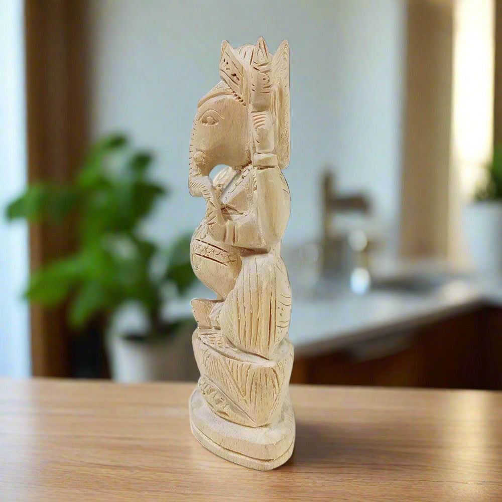 A hand-carved Sevan wood Ganesh ji idol, a perfect auspicious gift.