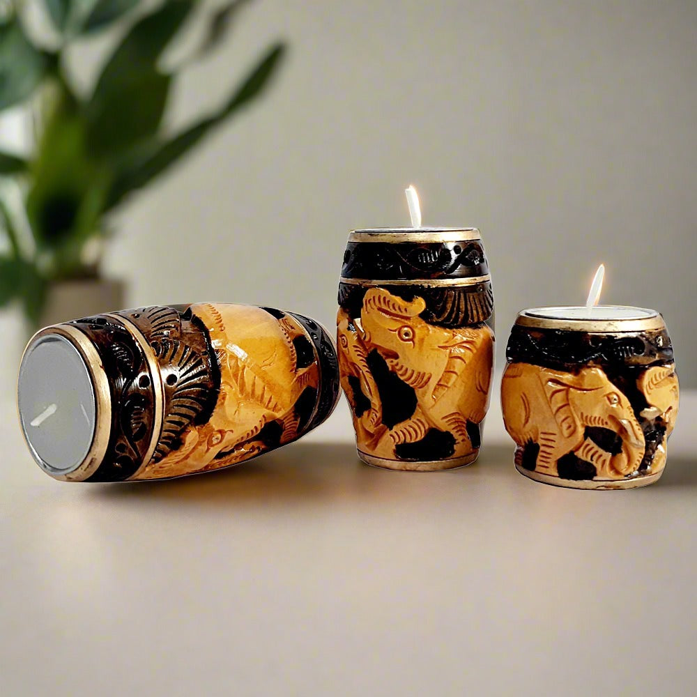 A hand-carved wooden candle stand set with excellent workmanship, perfect for a candlelight dinner on your dining table.