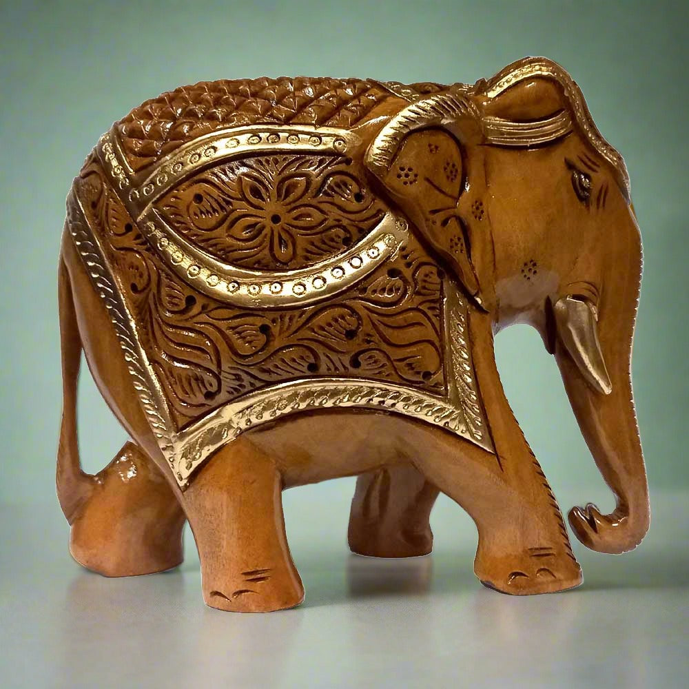 A hand-carved wooden elephant showpiece with a unique and attractive look.