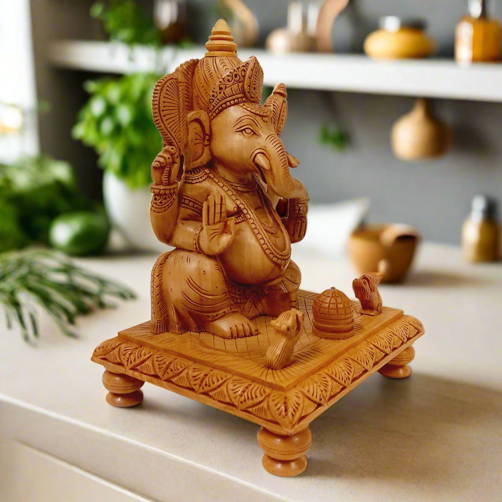 Hand-carved wooden Ganesh ji idol on chowki with two rats and laddu, crafted beautifully for worship spaces.