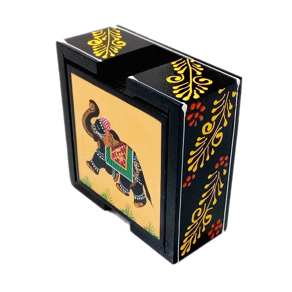 A beautiful hand-painted wooden coaster set with elephant, horse, and camel designs, and a decorated stand.