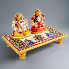 A hand-painted marble Laxmi and Ganesh statue, a perfect gift for Diwali.