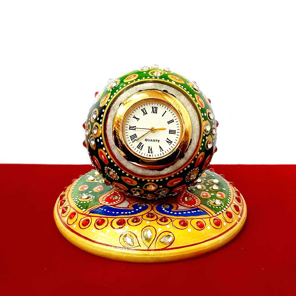 A unique hand-painted marble desk clock with studded stones, a perfect housewarming gift.
