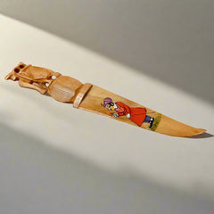 A hand-painted wooden paper cutting knife with good carving and a smooth polish.
