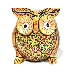 A hand-painted wooden owl figurine with a beautiful golden color, perfect for home decor.