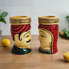 A beautiful hand-painted wooden pen holder, a useful and decorative piece for home and office decor.
