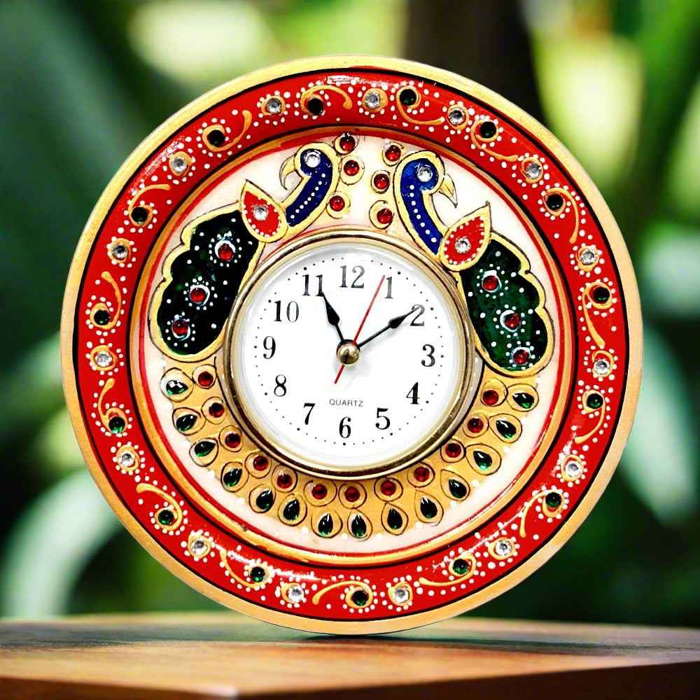 Handcrafted marble round clock with painted peacock and kundan stones front view.
