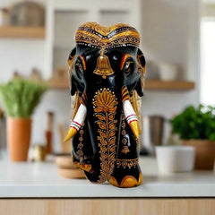 Handcrafted wooden elephant made of Kadamba wood, adorned with detailed miniature artwork and artistic painting.