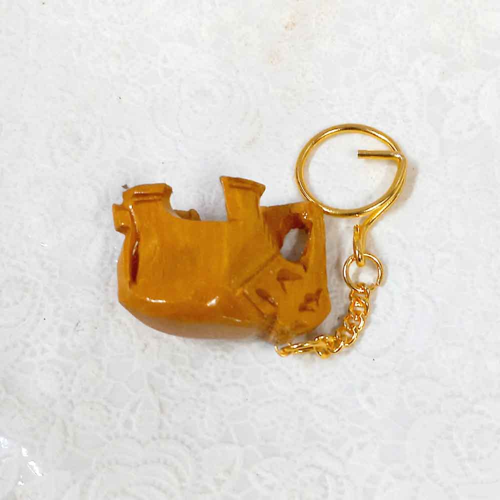 A splendid handcrafted wooden key fob with a unique elephant design, perfect for personal use.