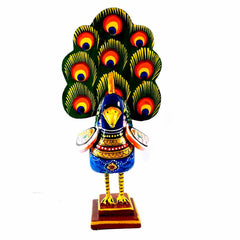 A handcrafted wooden peacock art piece in a dancing pose with colorful hand painting, perfect for home decor.