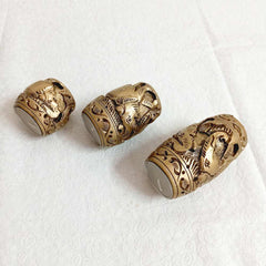 A handcrafted wooden t-light holder set of 3, perfect for creating a warm and cozy ambiance.