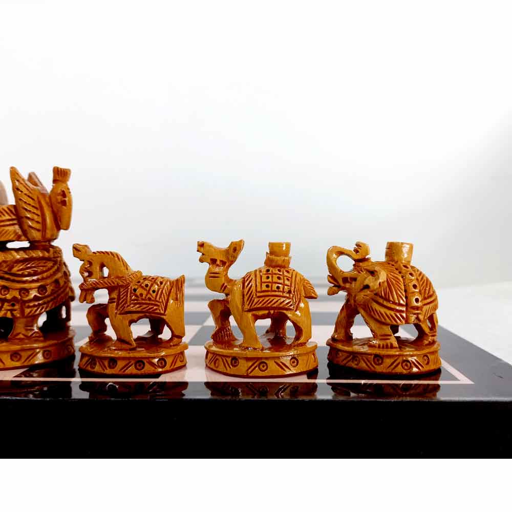 A handicraft wooden chess set with a playing board, featuring a unique Ambadi design.