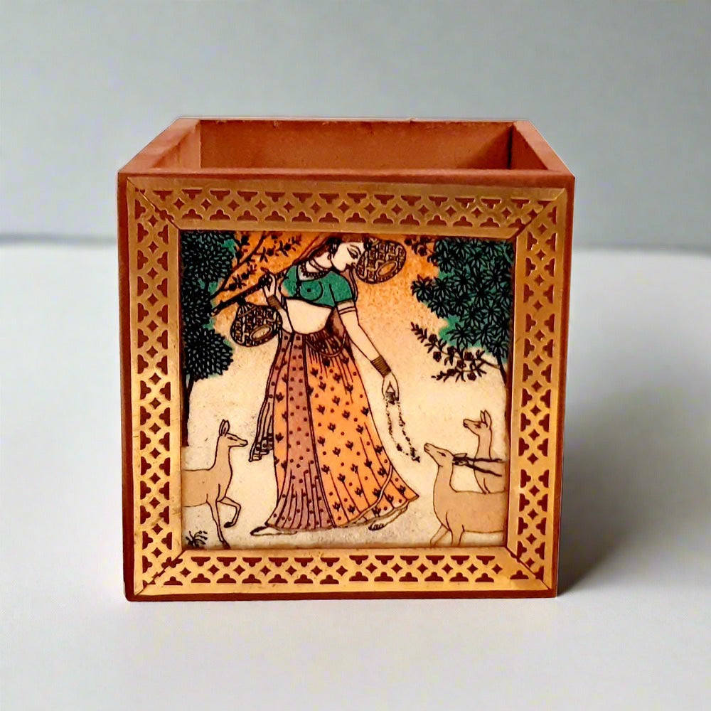 A handmade gemstone pen holder with a pure brass border, a great gift item.