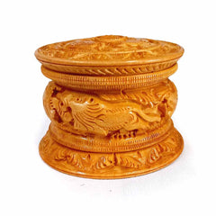 A handmade Kadamba wood box that is perfect for keeping both powder and jewellery.