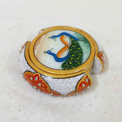 Handmade marble coaster set with colorful peacock paintings and embossed stand to attract attention on any table.