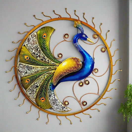 Handmade metal peacock wall decor showpiece with attractive hand painting and feathers adorned with glass pieces.