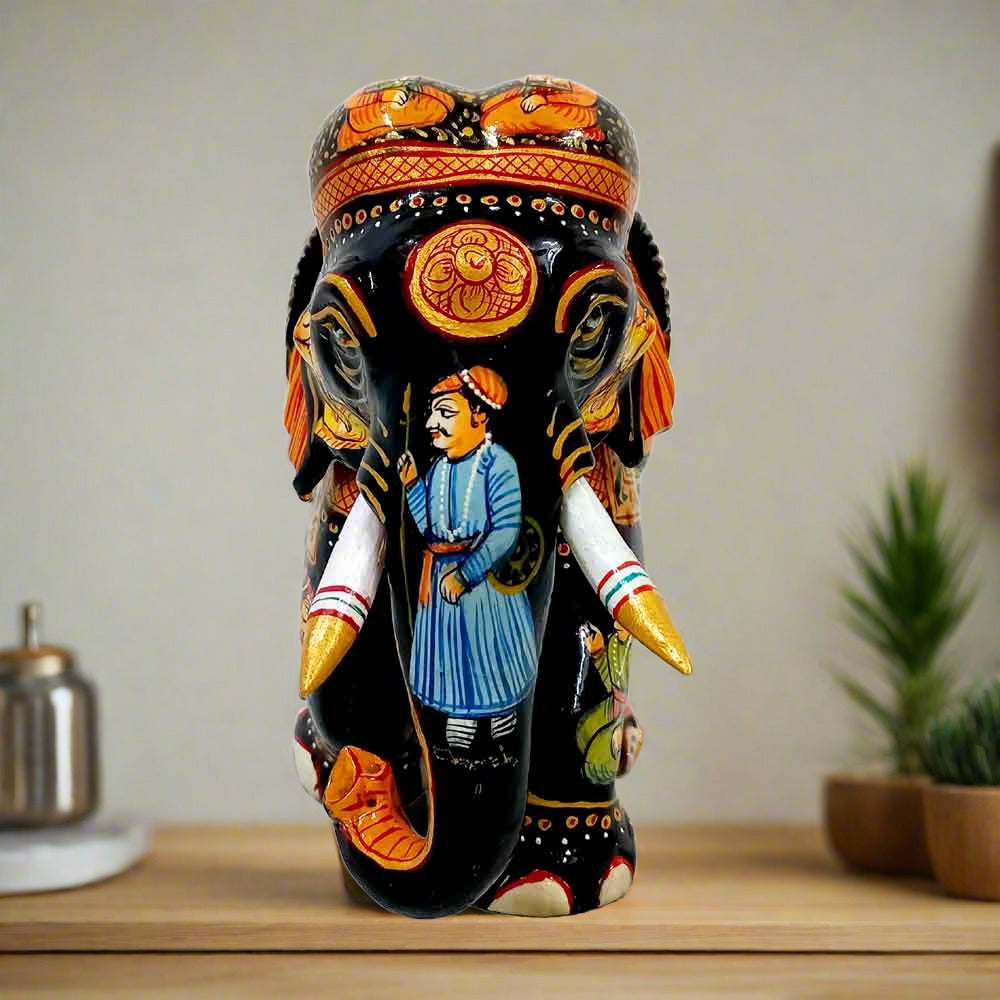 Handmade wooden elephant with detailed Mughal miniature artwork, showcasing royal motifs and traditional Indian craftsmanship.