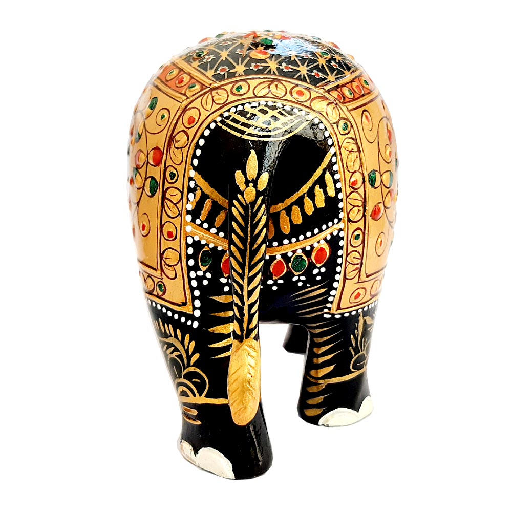 A handmade wooden elephant statue, a beautiful piece for gifting and decoration.