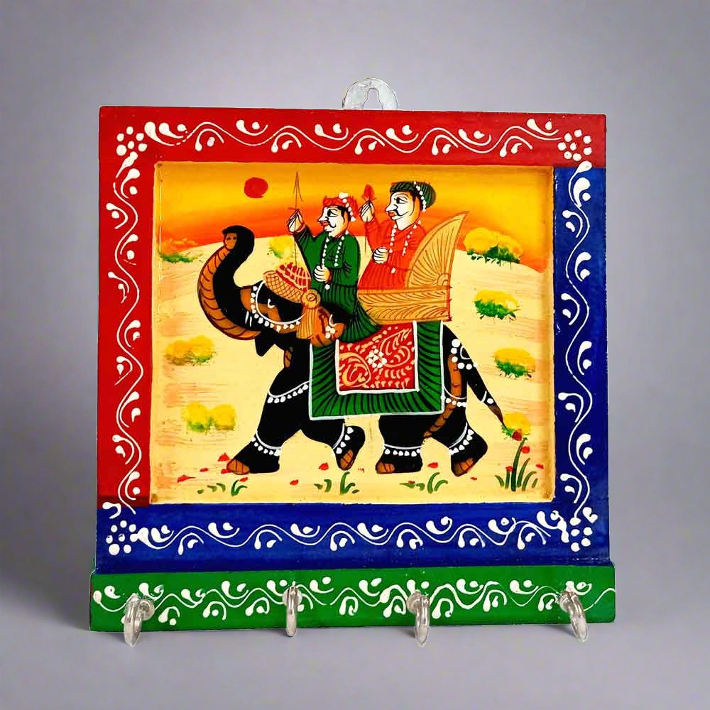 A handmade wooden key hanger with a beautiful miniature painting, a perfect piece of wall decor.