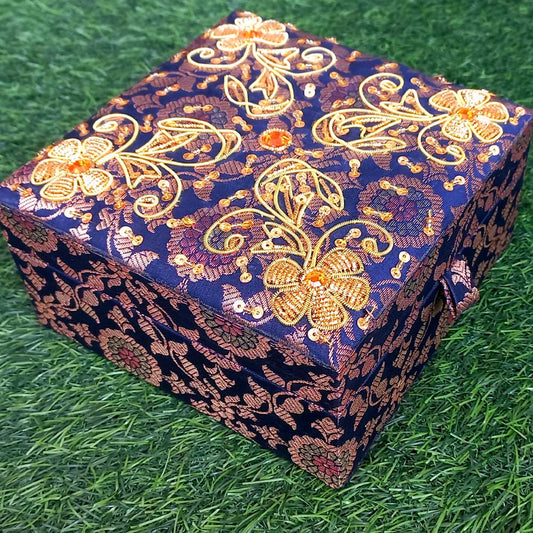 Handmade zardosi work makeup box with heavy embroidery using sequins and golden wire on assorted silk fabric.