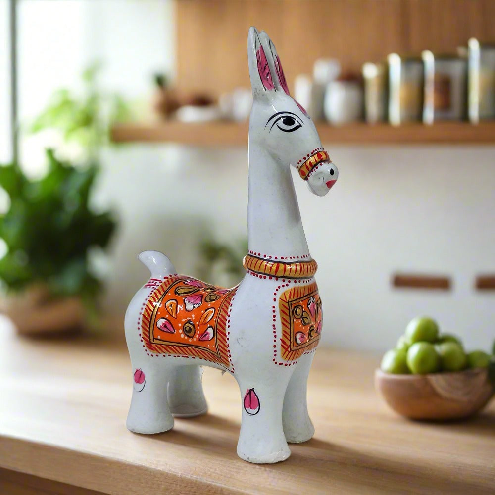 A high-quality metal horse figurine with beautiful meena painting.
