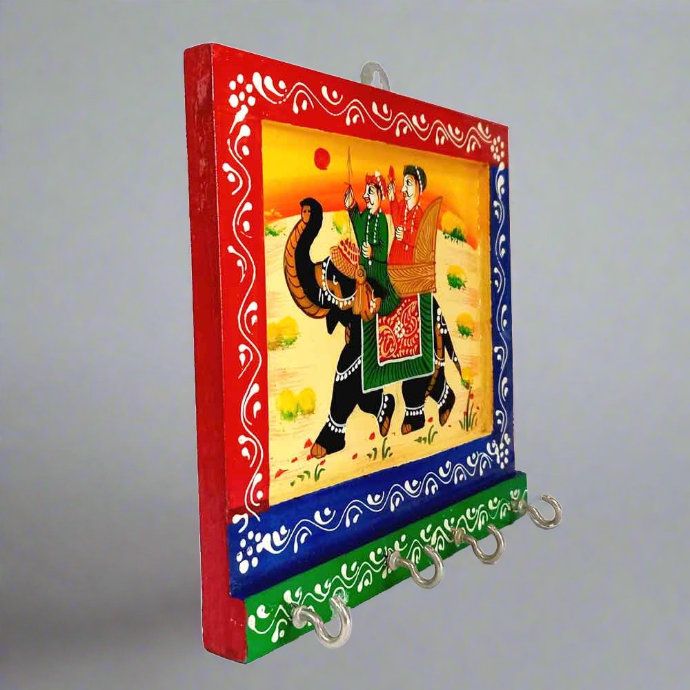 A high-quality wooden key rack with a handmade miniature painting.