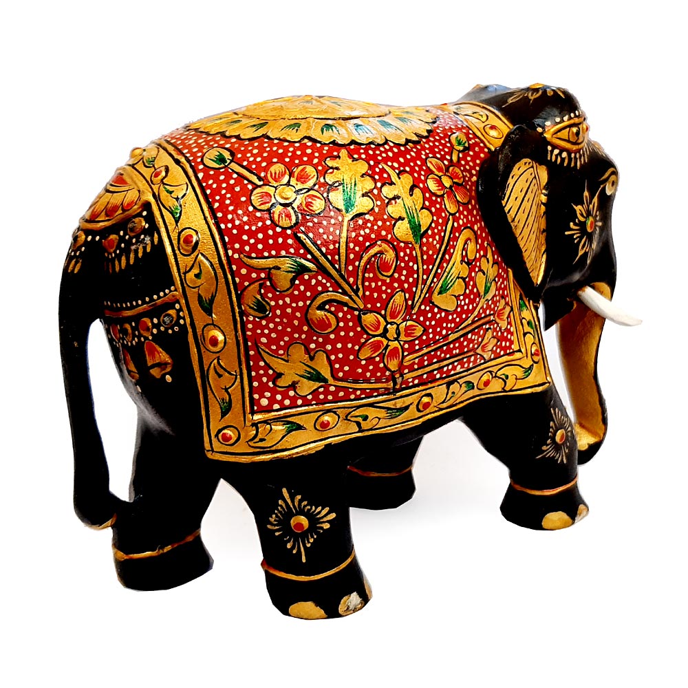 Hand-painted wooden elephant with red, black, and gold floral emboss design, a classic decorative figurine