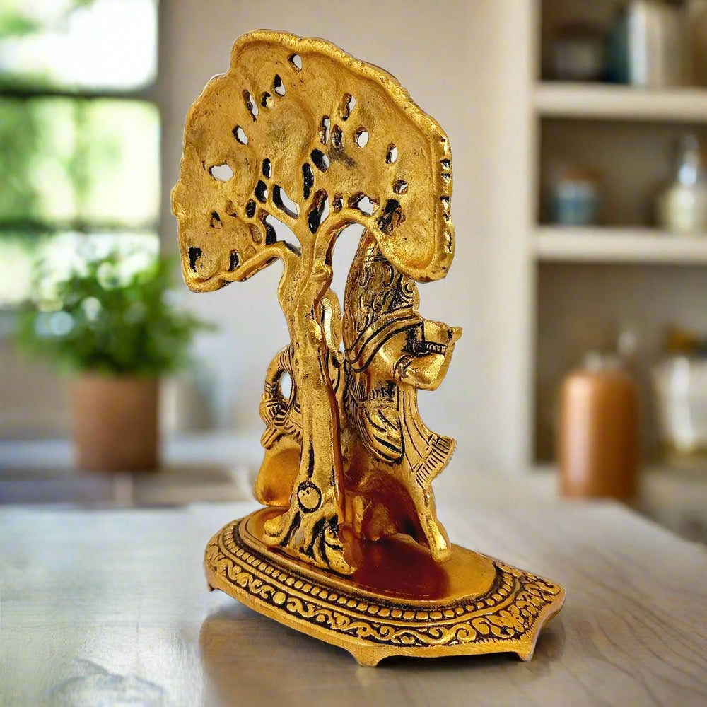 Traditional metal idol of Radha Krishna, exquisitely polished with gold oxidised finish