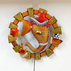 Illuminated metal Ganesh wall frame featuring built-in LED light, perfect for home or office decor and gifting.