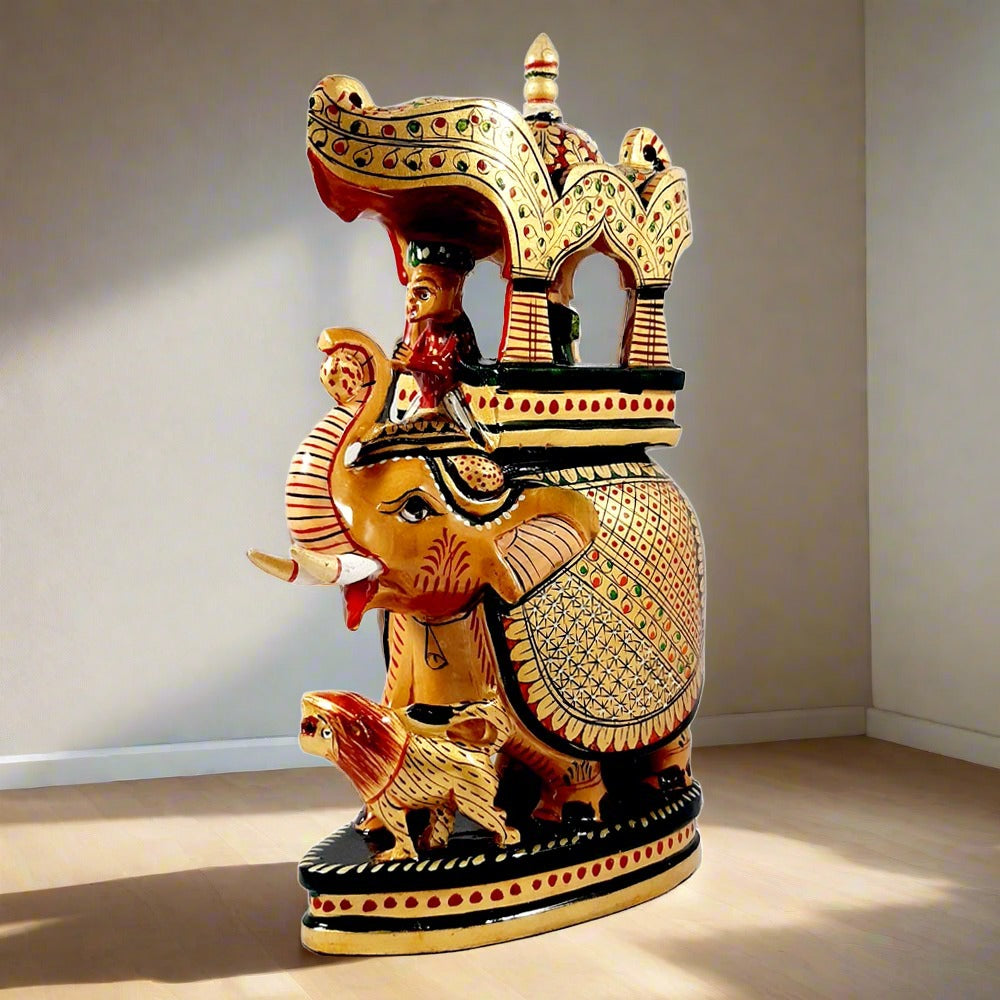 Attractive hand-painted Ambabari elephant statue made from high-quality kadamb wood, adding a royal touch to home or office.