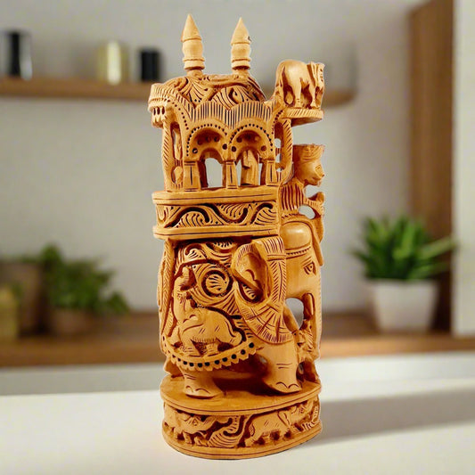 Round-shaped Amabari elephant statue made from kadamb wood with fine animal carvings, ideal for home or office decor.