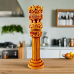 A wooden Ashoka Stambh from KK Gift Store, available in different sizes to suit your needs.