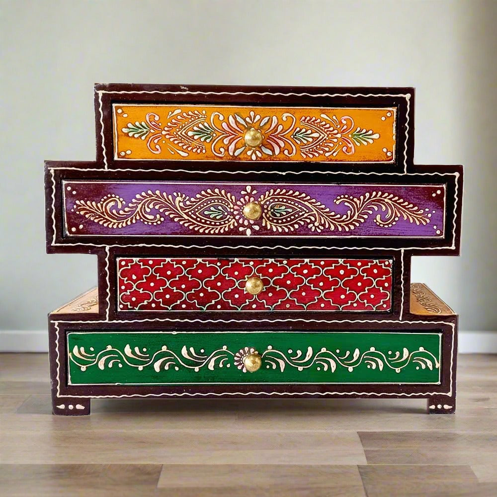 A beautiful, hand-painted wooden 4-drawer box by KKGiftStore with an embossed antique look.