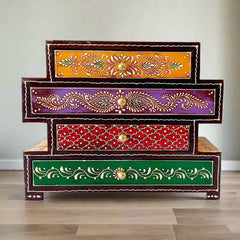 A beautiful, hand-painted wooden 4-drawer box by KKGiftStore with an embossed antique look.