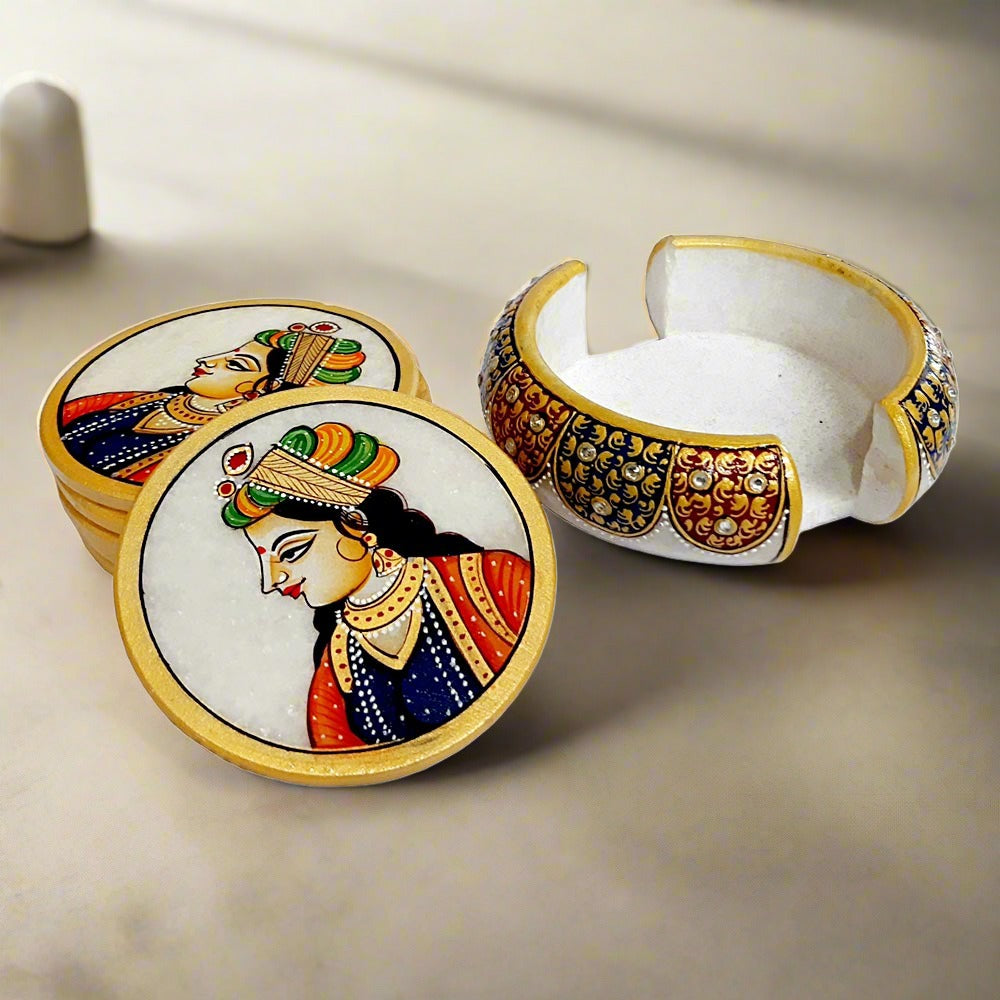 Pure marble coaster set with handmade lady painting, combining utility and decorative appeal