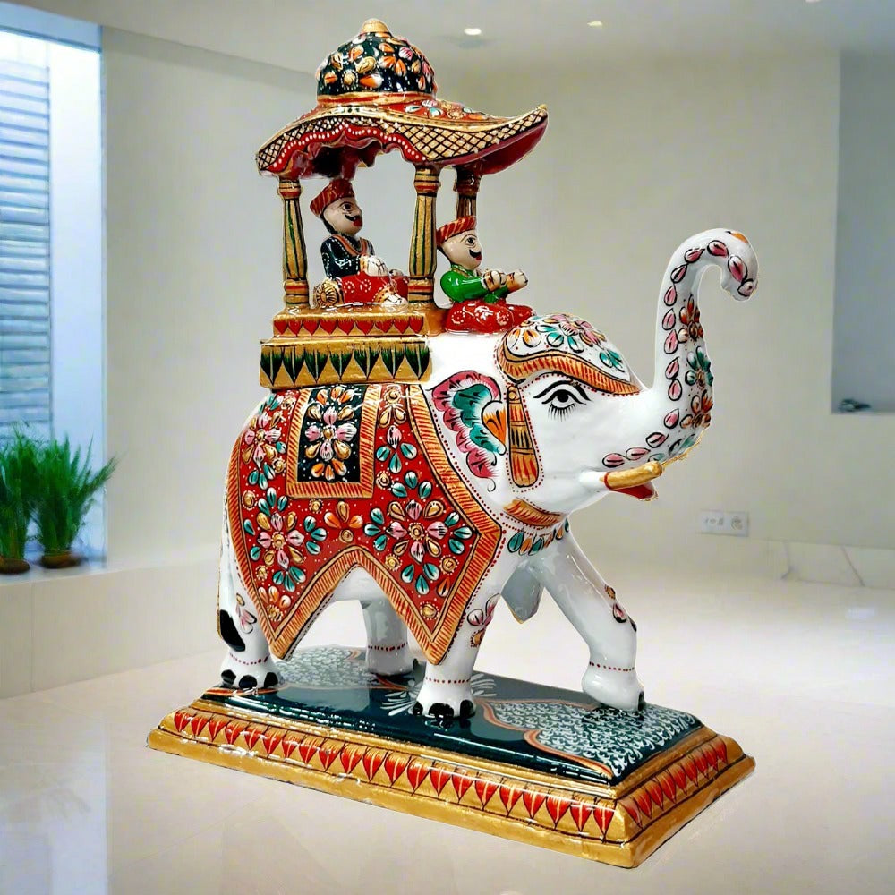 Large metal Ambabari elephant adorned with detailed meenakari hand painting, perfect for royal wedding decor and living spaces.