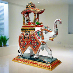 Large metal Ambabari elephant adorned with detailed meenakari hand painting, perfect for royal wedding decor and living spaces.