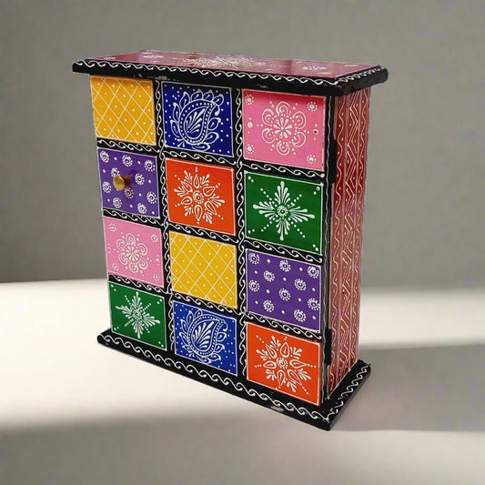 Large wooden key box decorated with vibrant hand painting, perfect for organizing and storing keys in home or office.