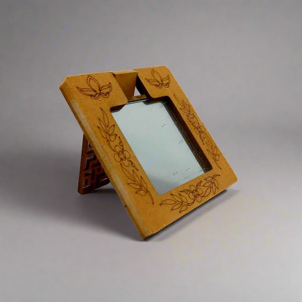 A beautifully designed wooden mirror with intricate lattice work, a great gift for women during festivals.