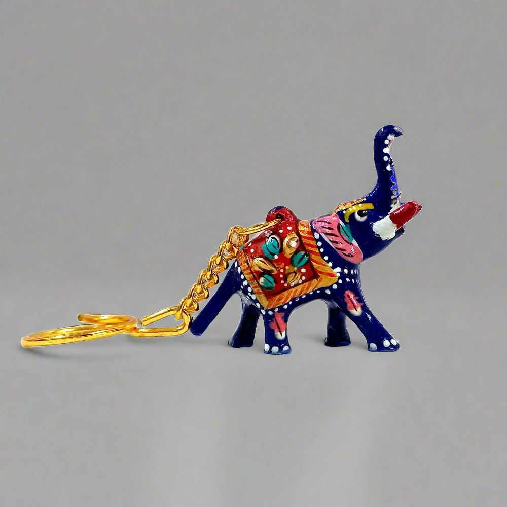 A lucky elephant key ring with beautiful Meenakari hand painting, an ideal gift for return gifts.