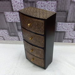 Luxurious antique wooden box with four drawers, enhanced by beautiful metal floral work, adds elegance to any home.