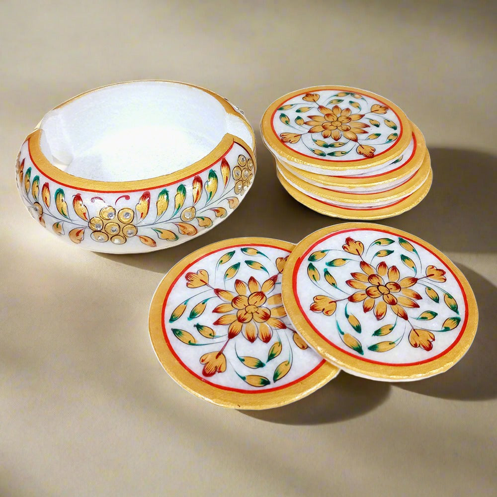 Elegant marble tea coaster set with detailed hand-painted motifs, ideal for home and office