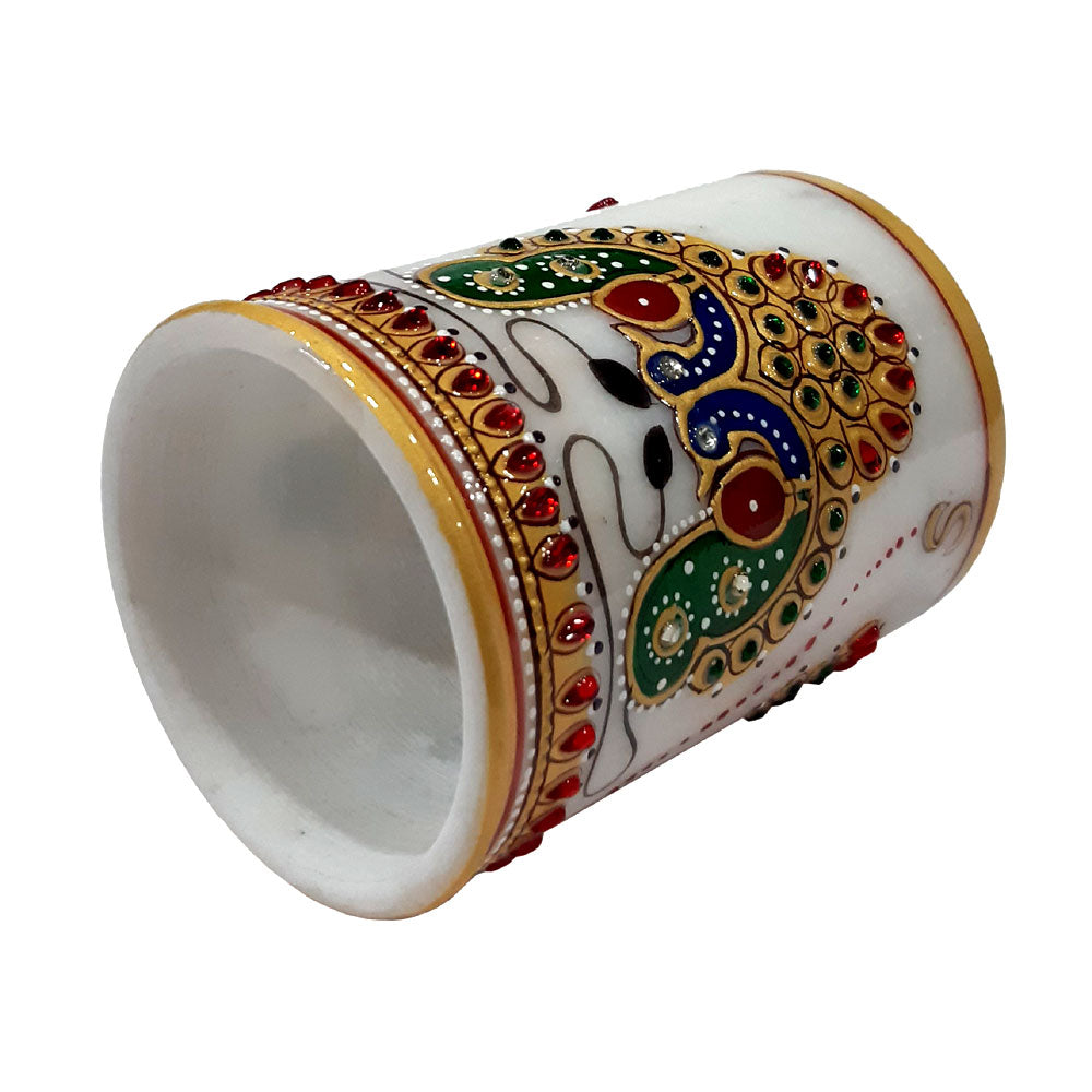 A versatile marble pen holder that doubles as a piece of decor for a study room or office.