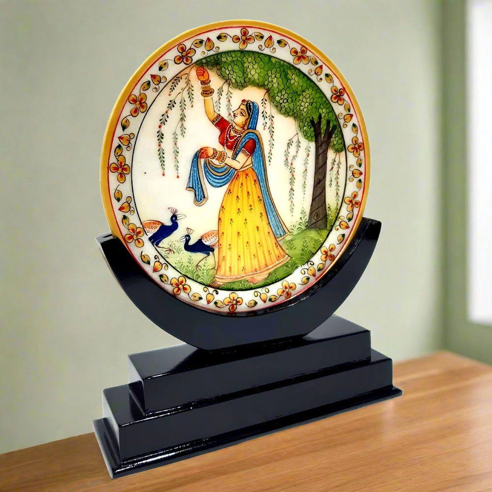 A beautiful marble showpiece with a lady painting, perfect for an office desk, computer table, or showcase.